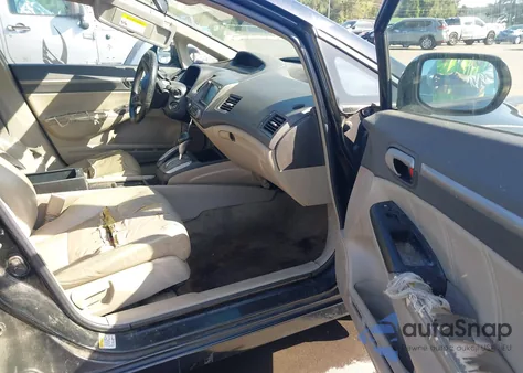 2010 Honda Civic Hybrid from USA, damaged, VIN JHMSA3F21AS005780